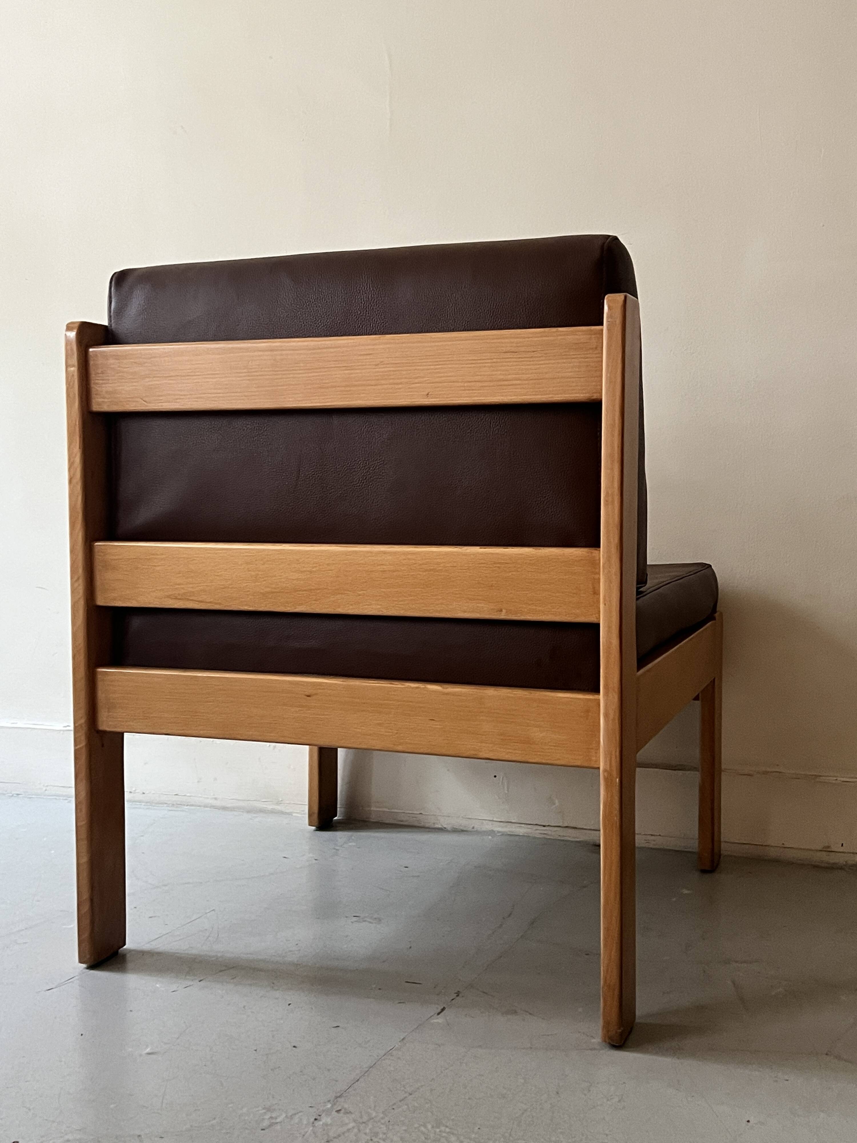 Modernist wooden armchair by Bauman, 1970 design.