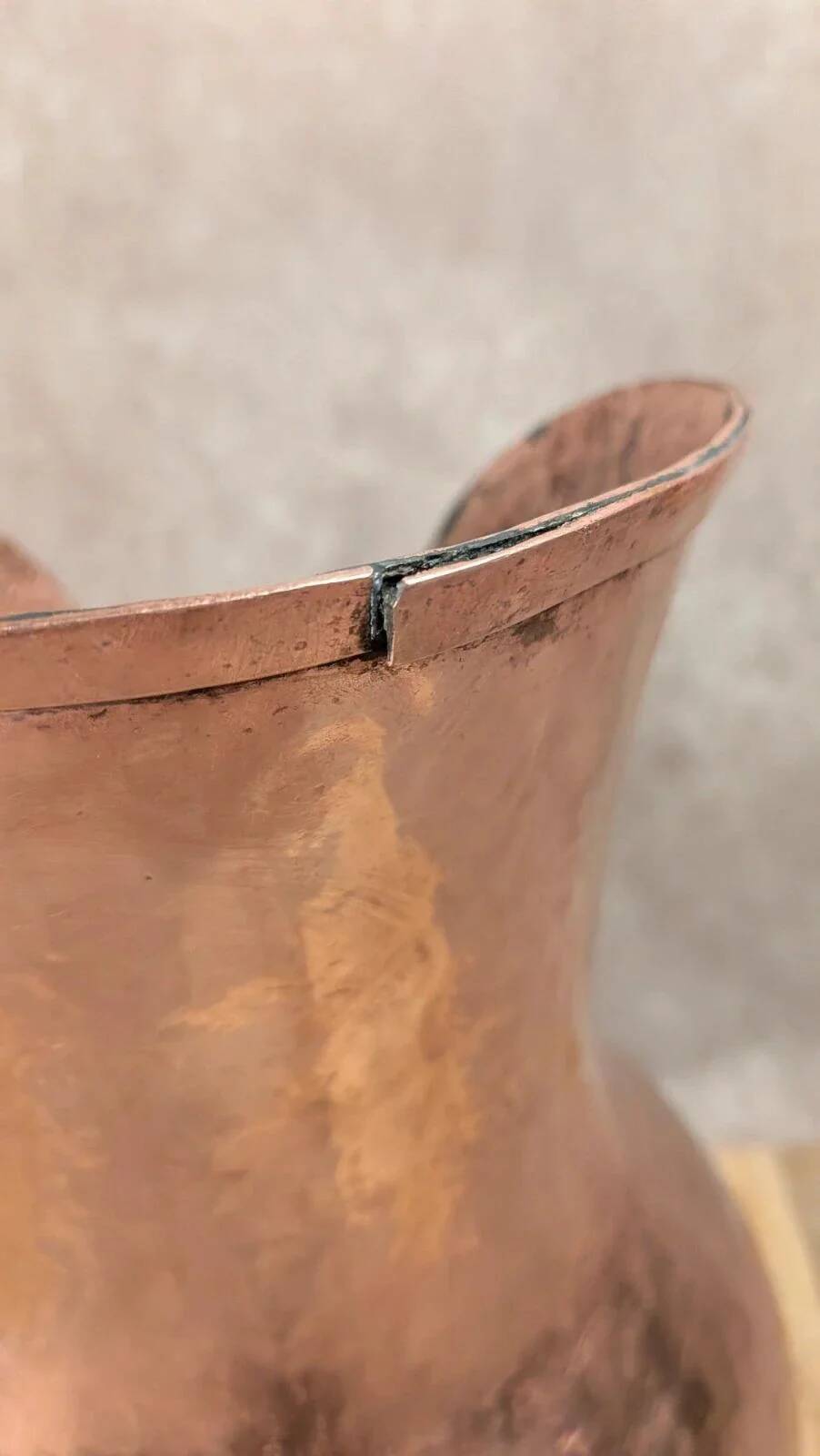 Antique hammered copper jug