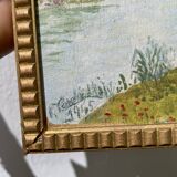 Small landscape painting with golden frame
