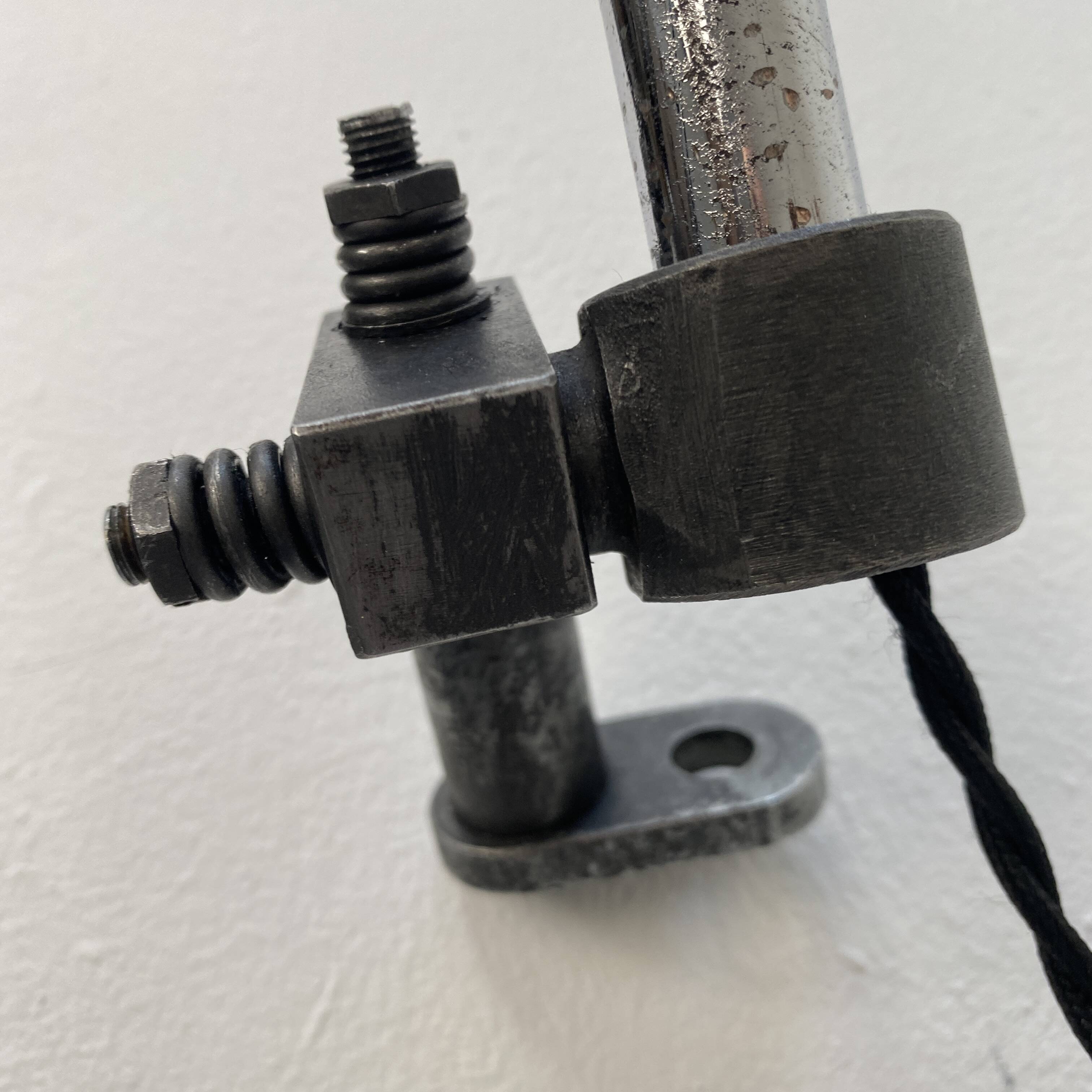 Old industrial wall light that is vintage.