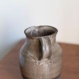 Signed sandstone pitcher