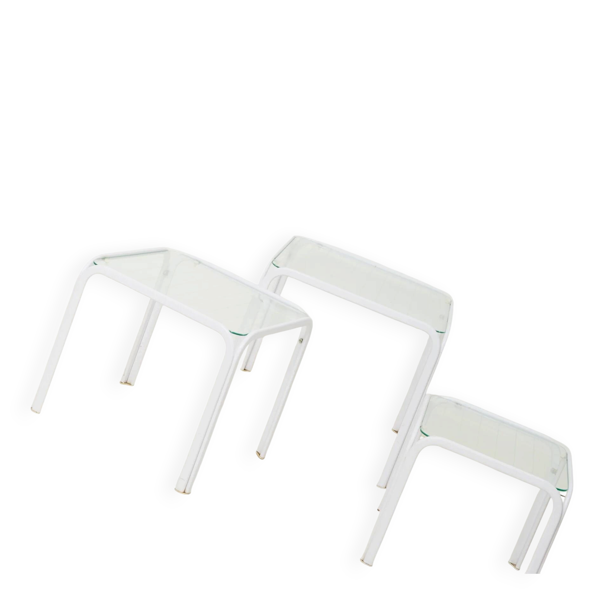 Nested tables in white lacquered metal, Italy, 1970s.