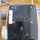 Grey vintage rotary dial phone with earpiece