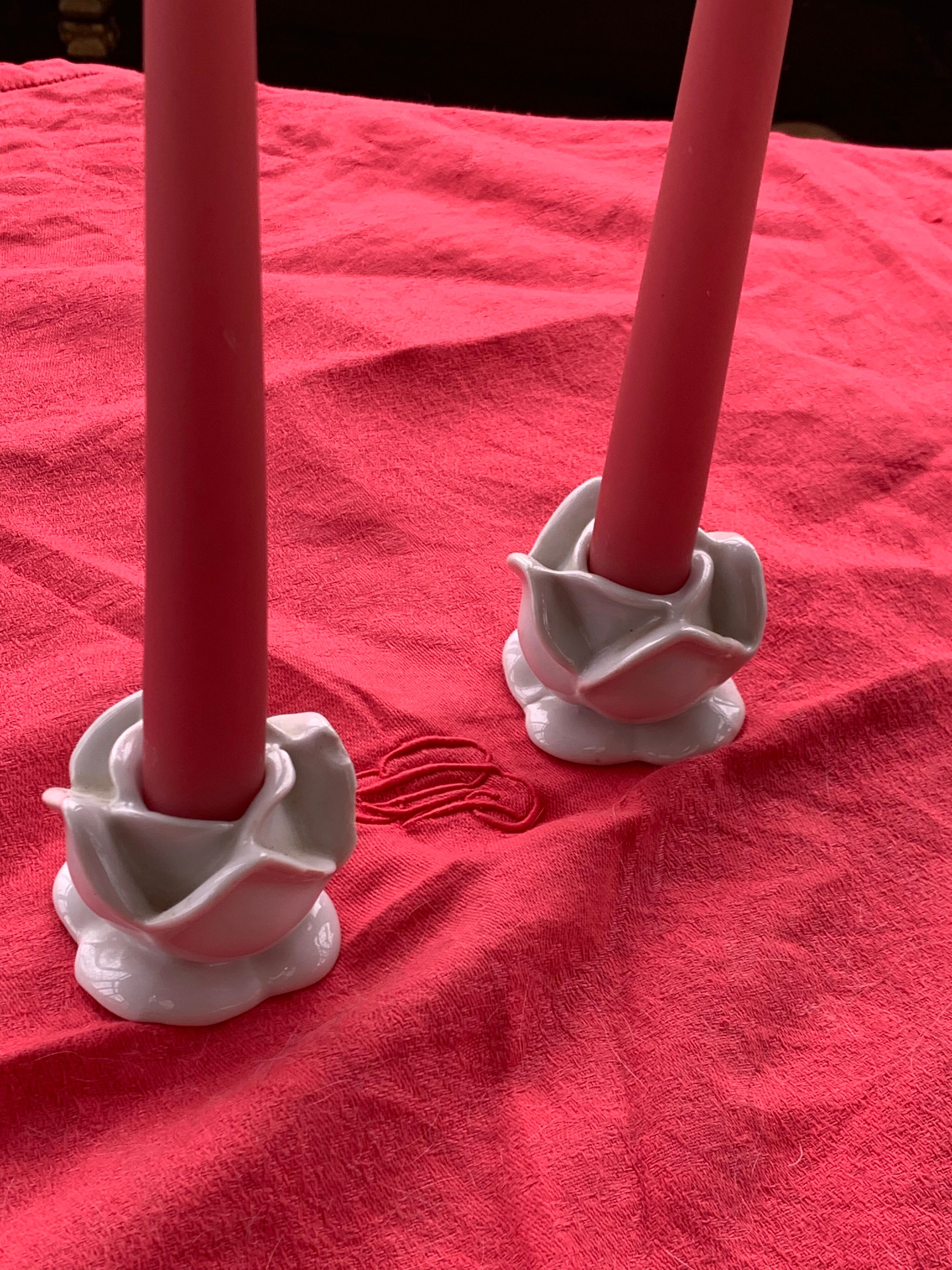 Two vintage white porcelain flower candle holders