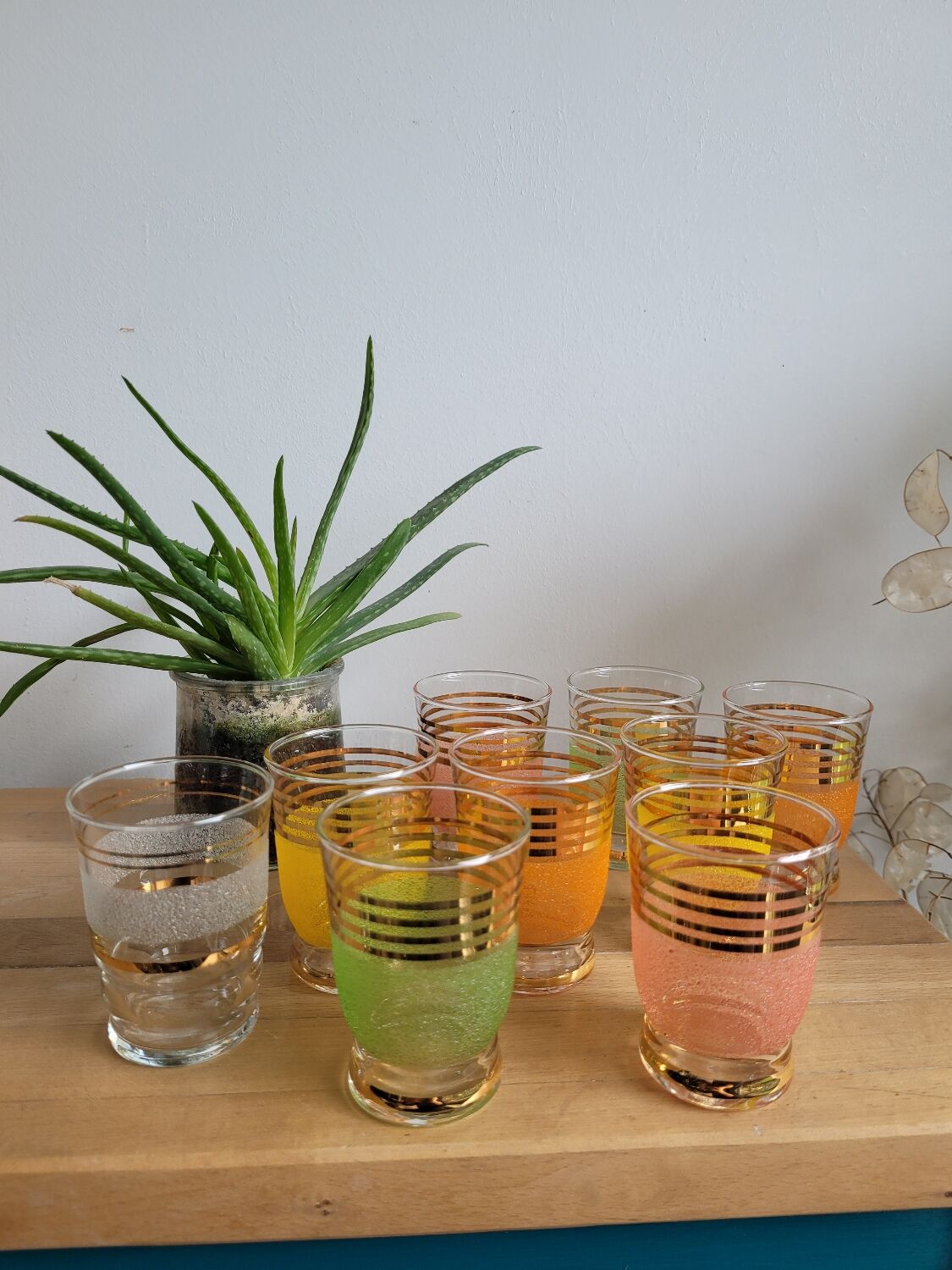 Set of 9 gilded granite glasses
