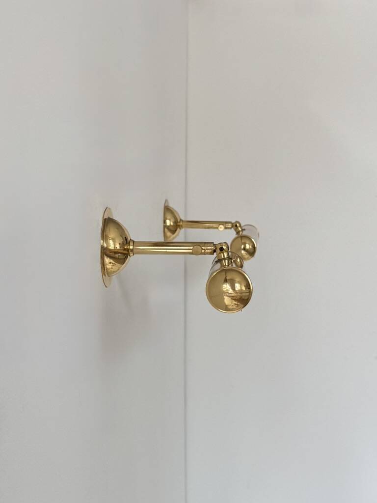 Pair of adjustable vintage brass wall lights, France, 1970.