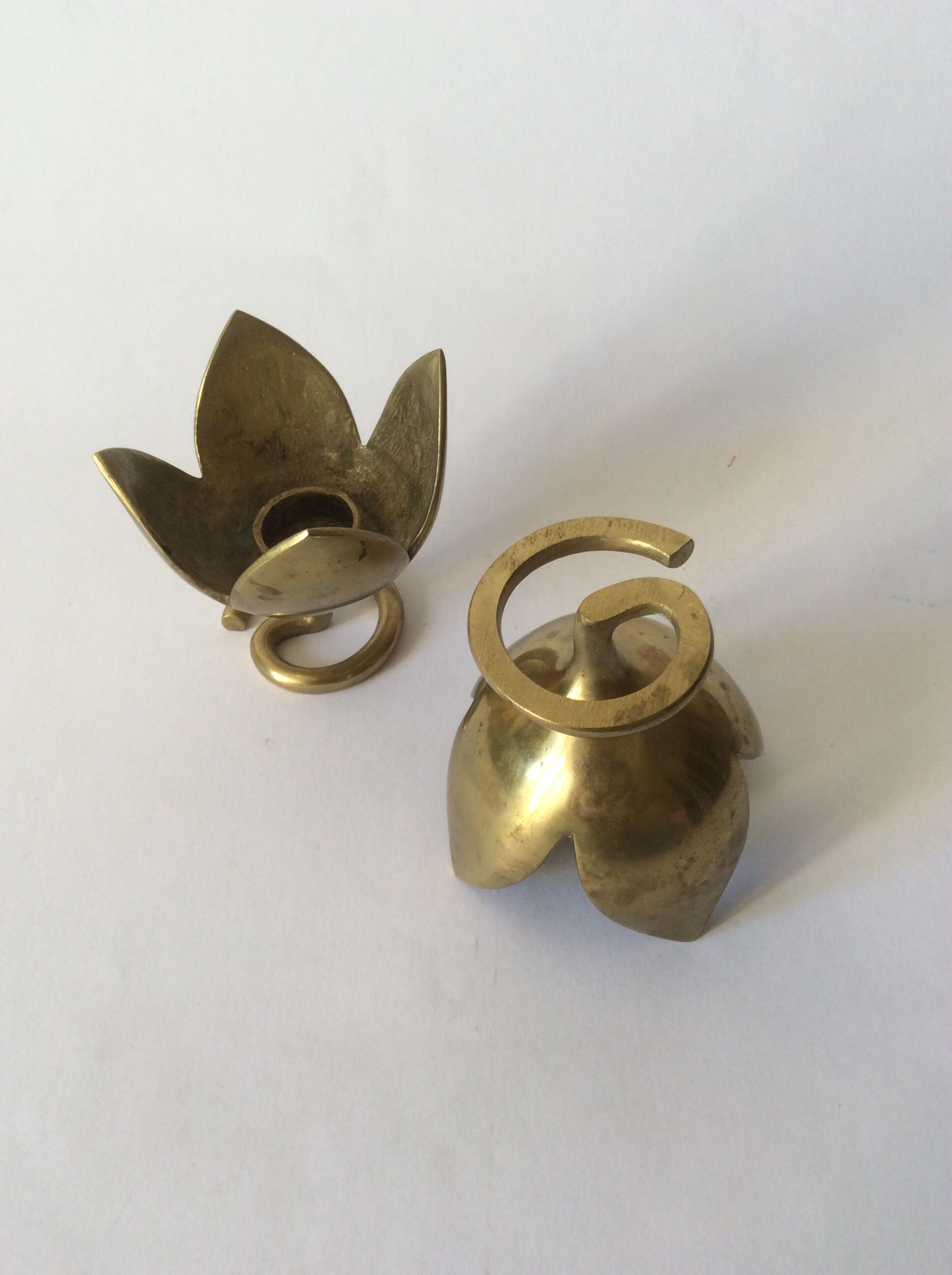 Pair of brass lotus flower candlesticks