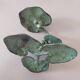 Ivy leaf design candle holder in green patinated metal