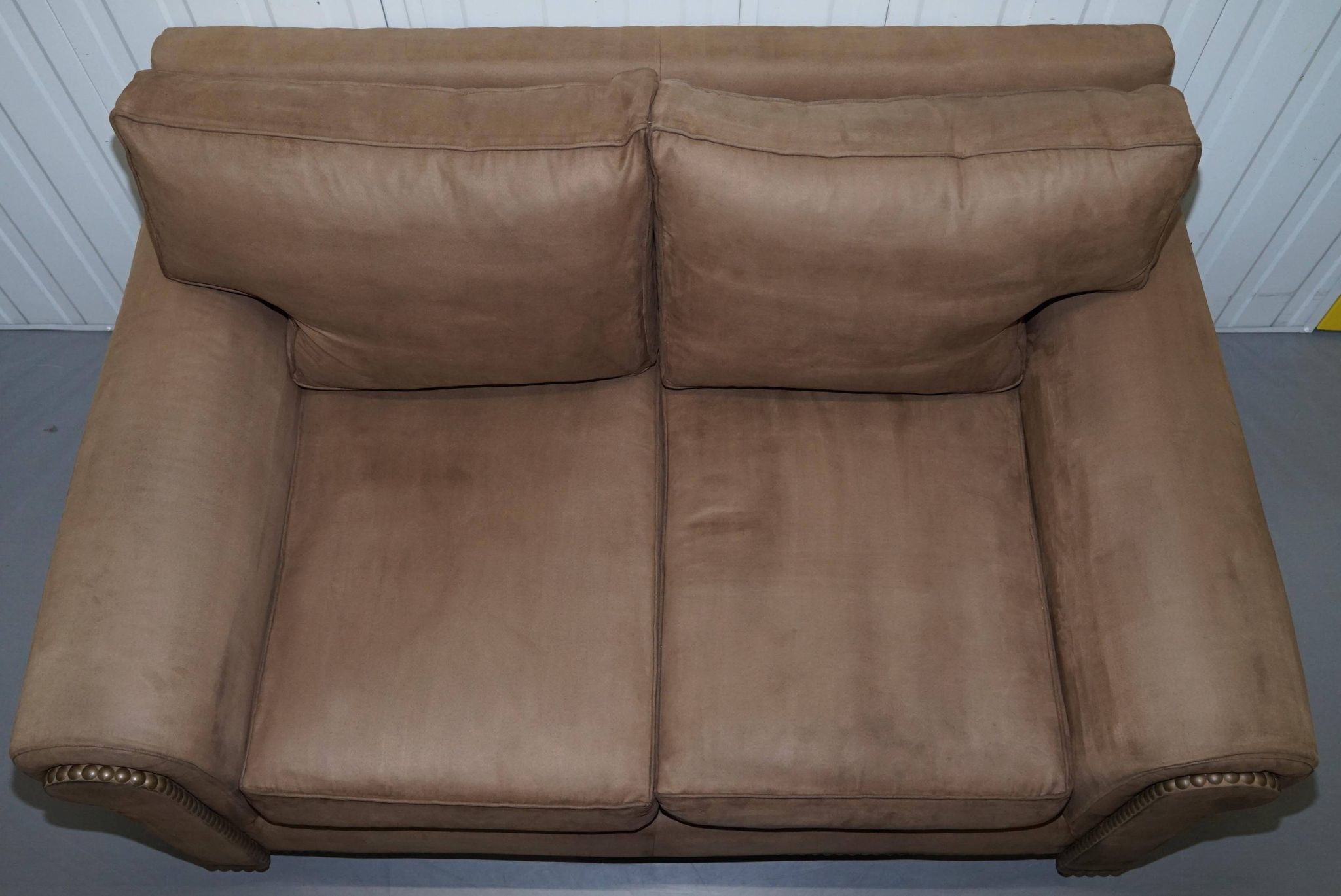 Ralph Lauren Jamaica velvet sofa pair with feather cushions.