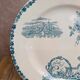 Dessert plate in ironstone Clairefontaine model Buffon blue with old landscape decoration.