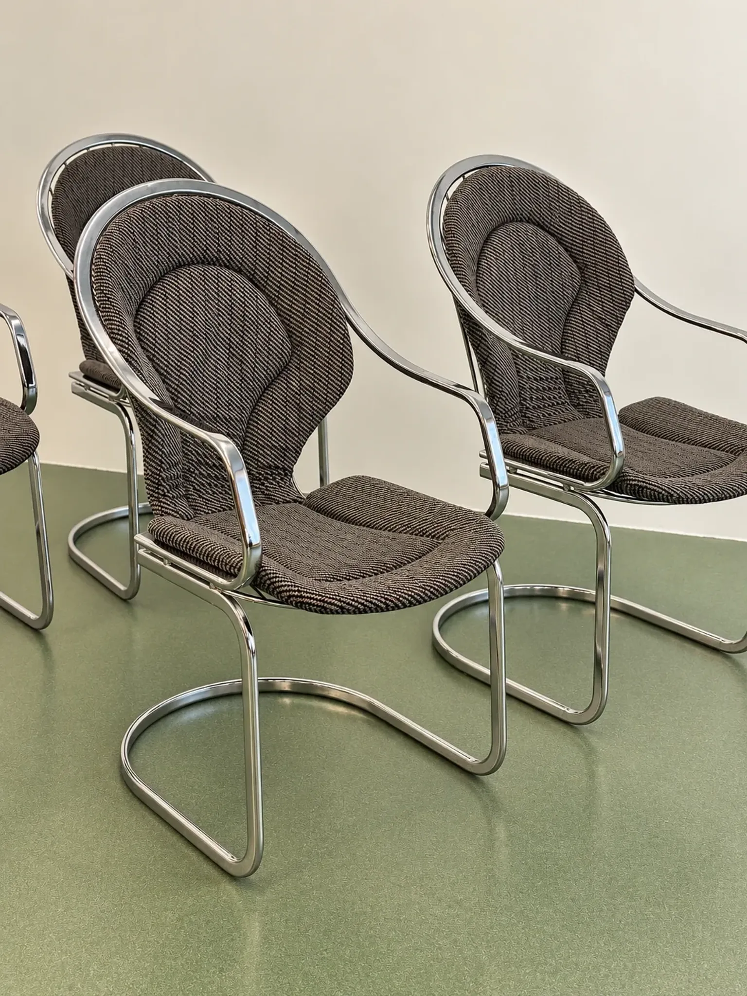Set of four chrome cantilever dining chairs, 1970s