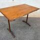 Varnished bistro table, cast iron legs