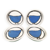 Handmade white ceramic plates with a blue bird in folk art style, set of 4.