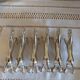 Silver metal horse-shaped knife rests