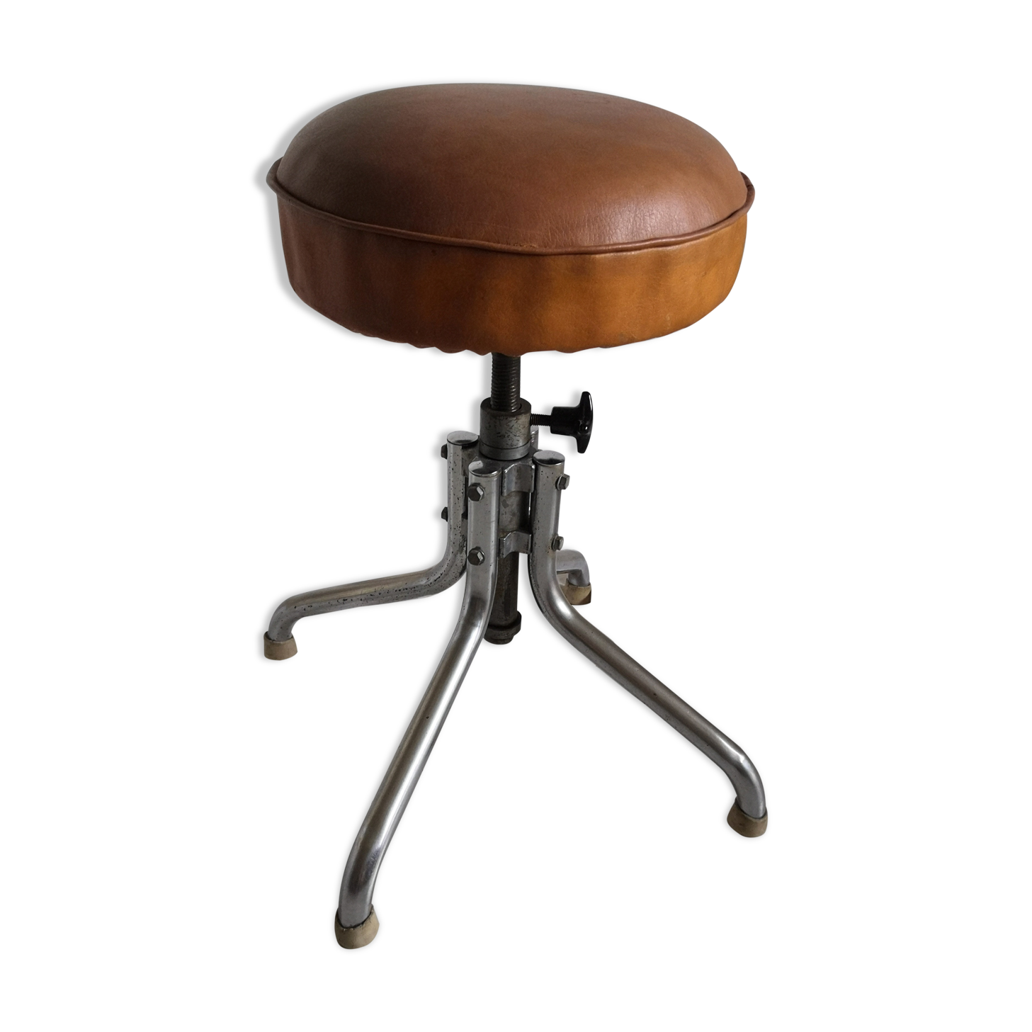 Vintage rotating stool seated in leather and chrome legs
