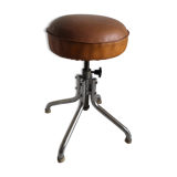 Vintage rotating stool seated in leather and chrome legs