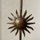 Vintage sun-shaped wrought iron lamp foot