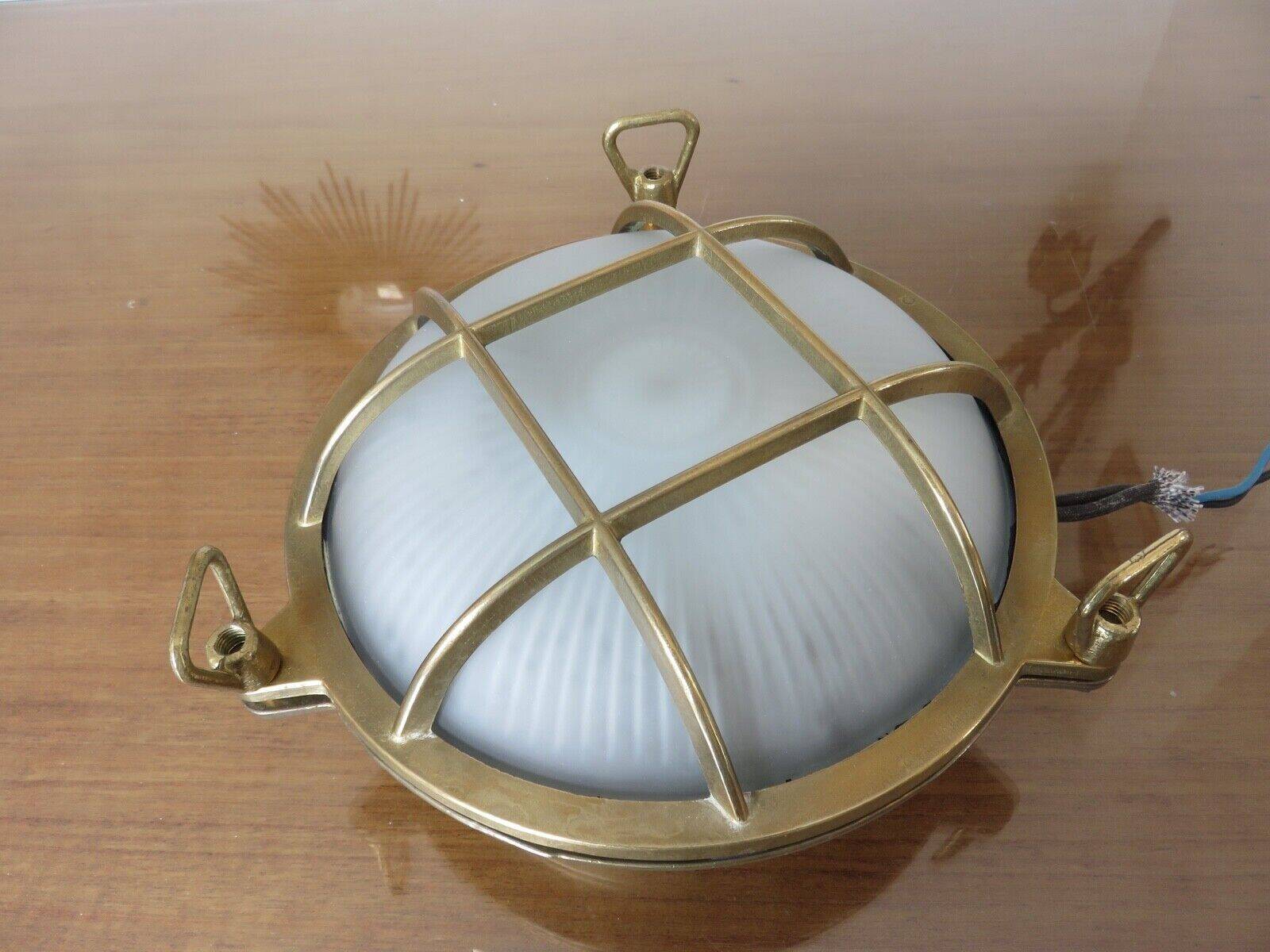 Brass porthole wall lamp