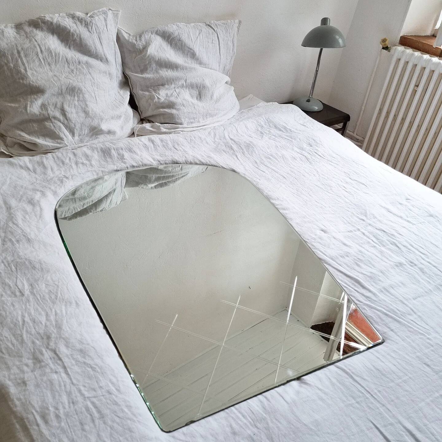 Large vintage beveled arch mirror