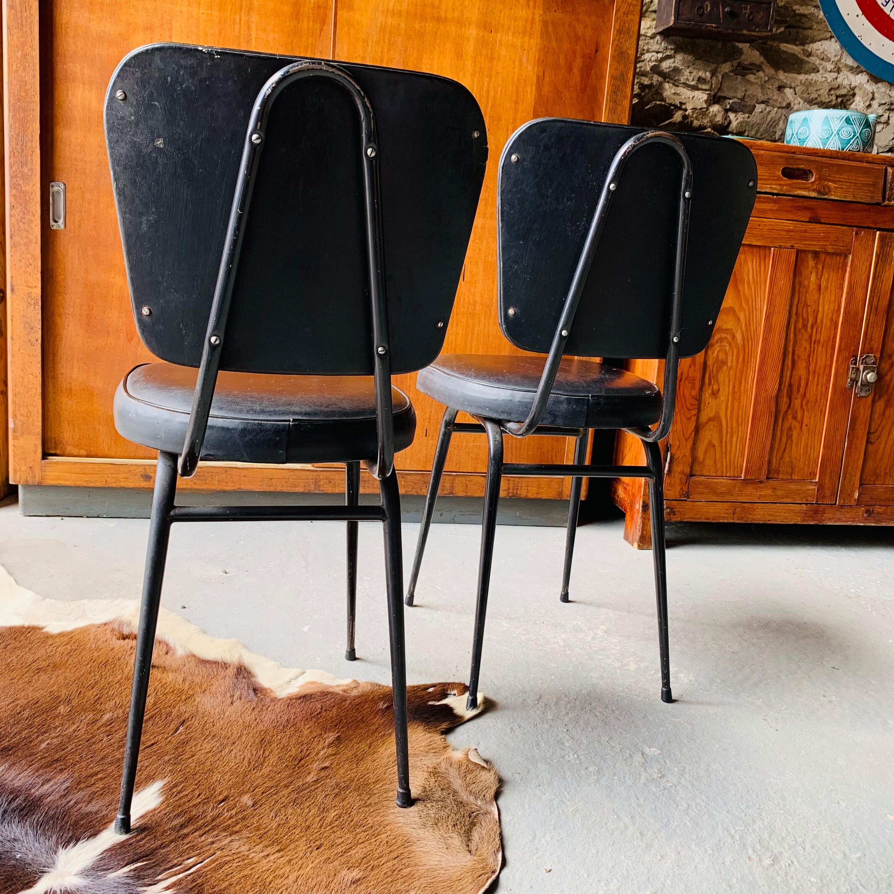 Pair of vintage black skai chairs