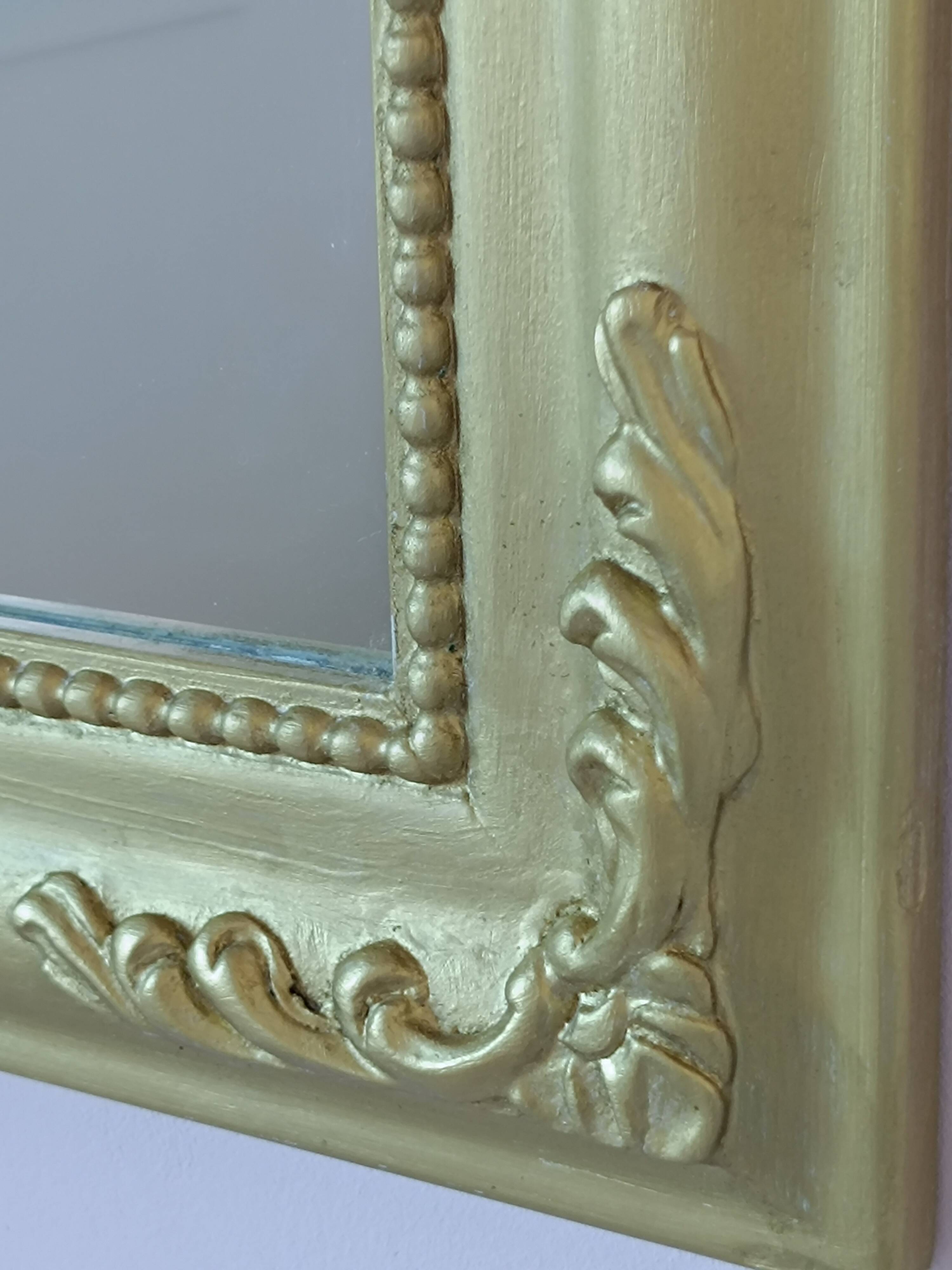 Gilded mirror with a Louis Philippe style pediment
