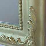 Gilded mirror with a Louis Philippe style pediment