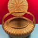 Worker vintage wicker covered basket