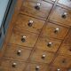 Large dutch oak apothecary cabinet / barber cabinet with enamel shields, 1900s