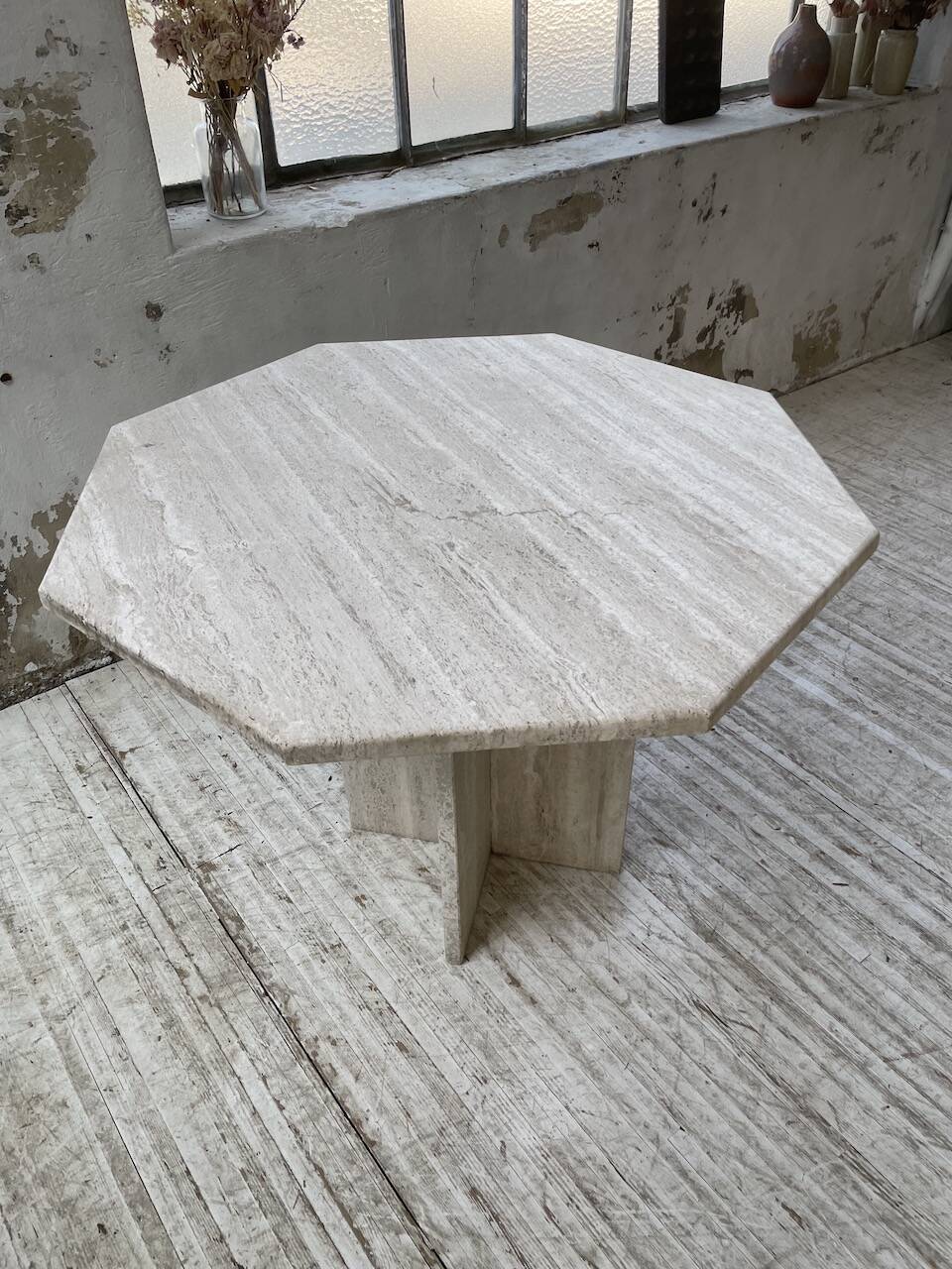 Octagonal travertine coffee table