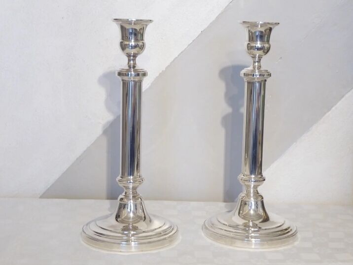 Pair of silver metal candle holders