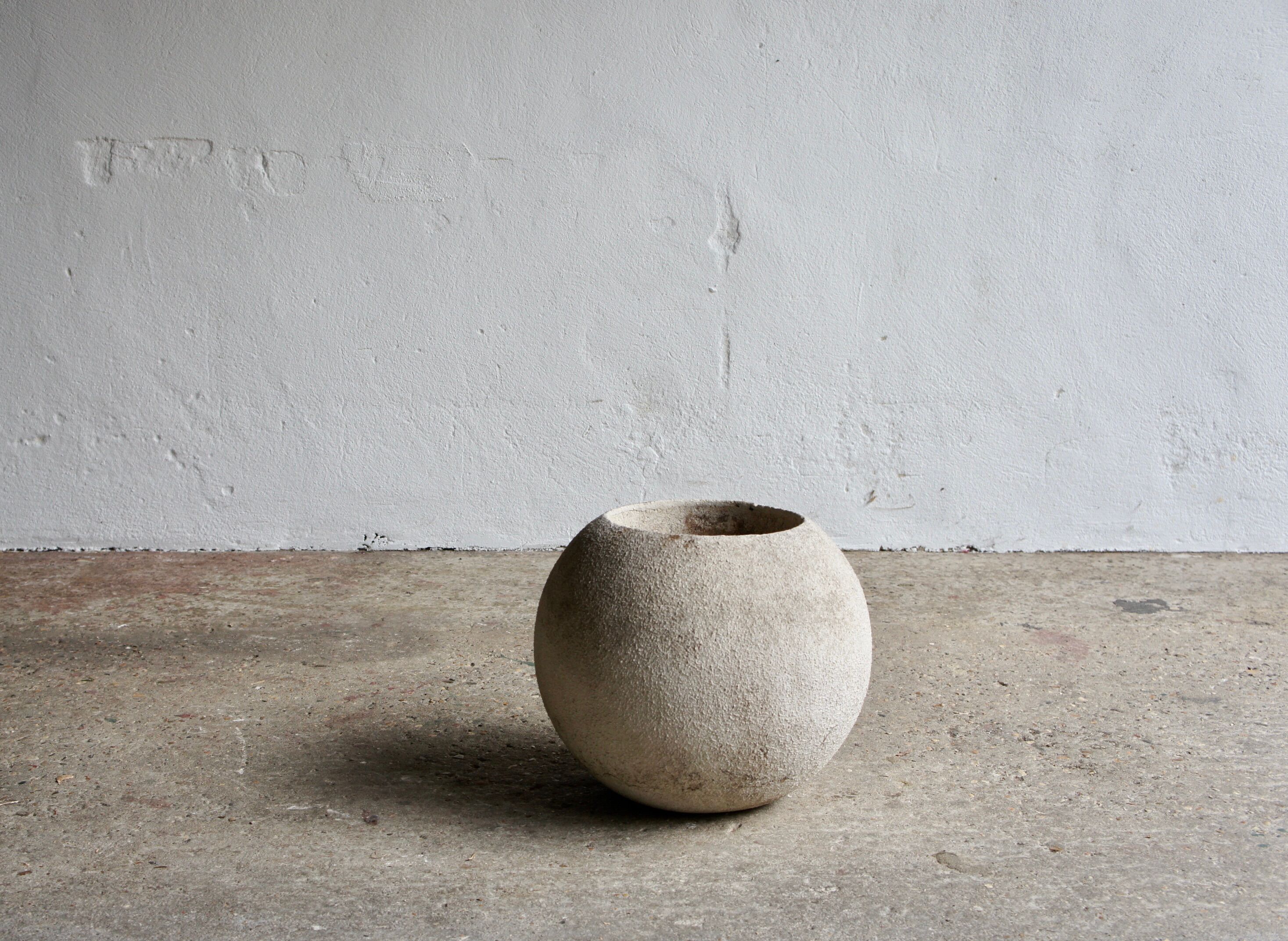 Spherical concrete planter