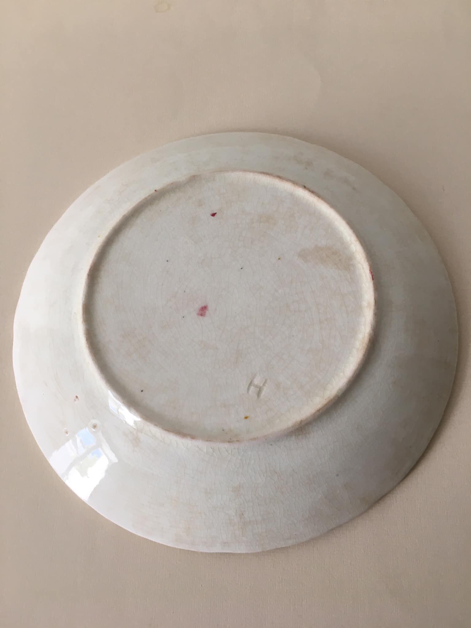 Old slip plate decorated with Majolica roses