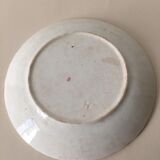Old slip plate decorated with Majolica roses