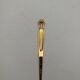 Gold plated letter opener.