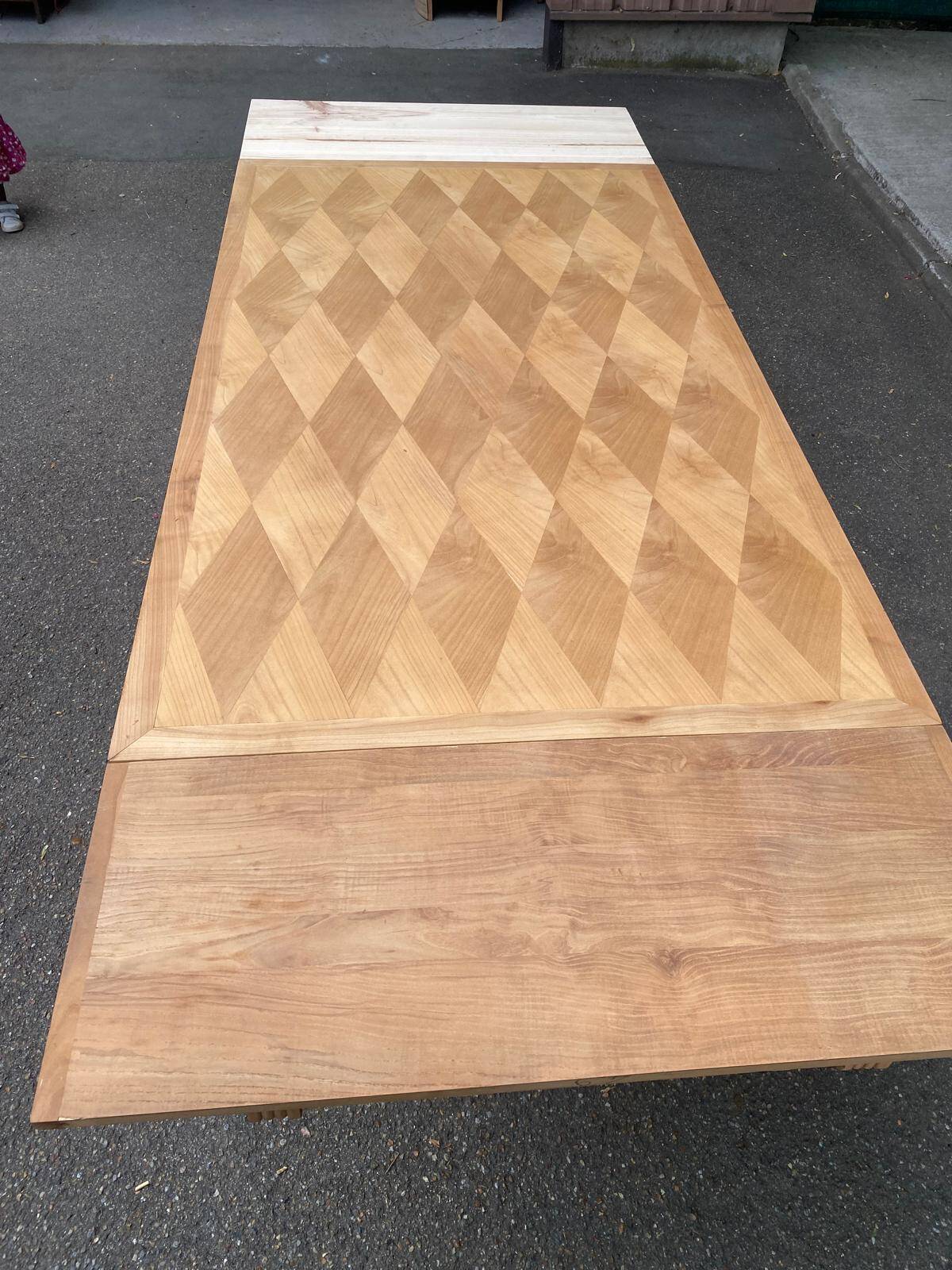 Renovated 1950s wooden Art Deco extendable dining table.