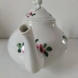Porcelain teapot with rose patterns