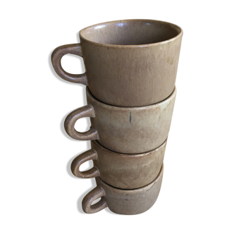 Series of 4 cups of sandstone