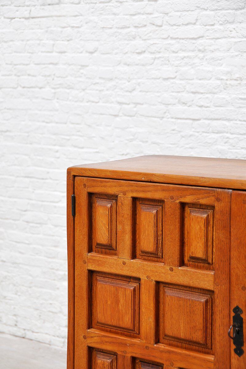Brutalist Spanish oak cabinet with wrought-iron hardware, 1940s