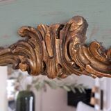 Miroir ancien de style Louis XV en bois et stuc doré.