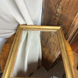 Antique mirror in gilded wood