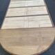 Round extendable dining table Napoleon III renovated in 19th-century oak.
