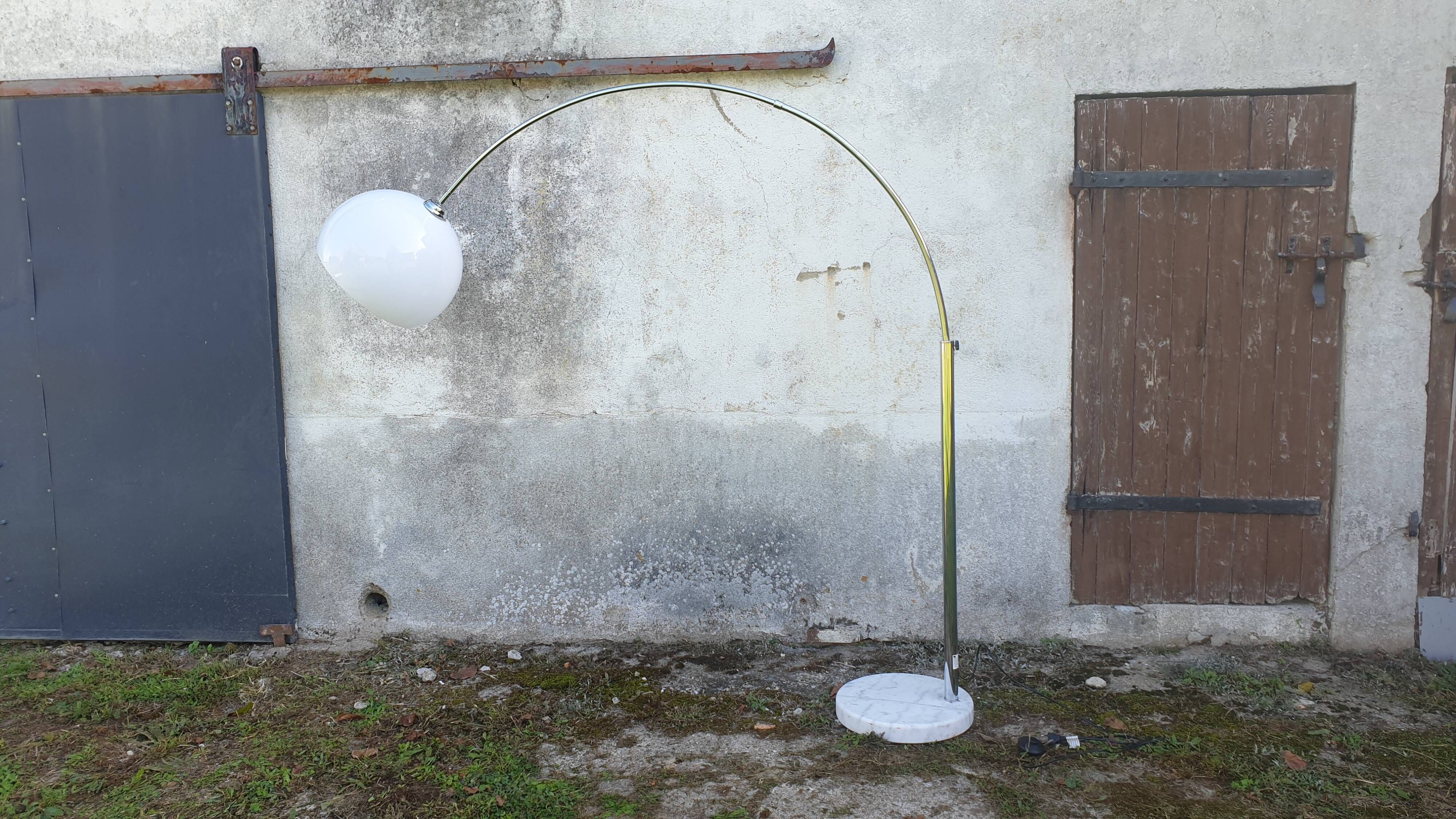 Chrome arc floor lamp with white globe, Space Age style from the 70s, BVH edition.