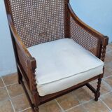 Vintage armchair in turned wood and cane, upholstered seat, 1940s