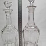Set of two carved crystal decanters, 24 cm