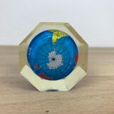 Globe paper press under resin