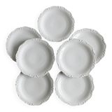 7 assiettes anciennes en porcelaine blanche