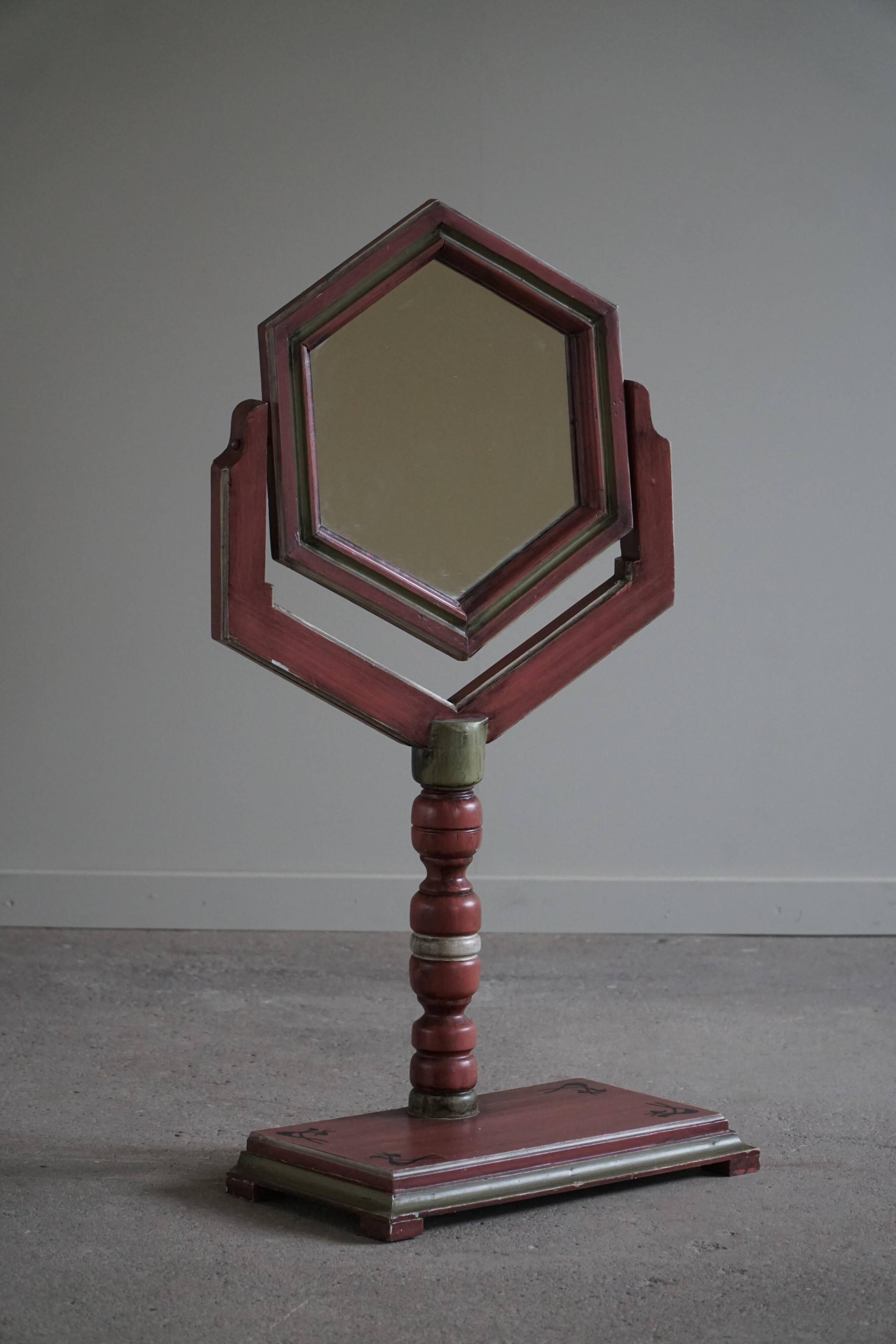 A pine table mirror by a Swedish cabinetmaker, folk art, early 20th century.