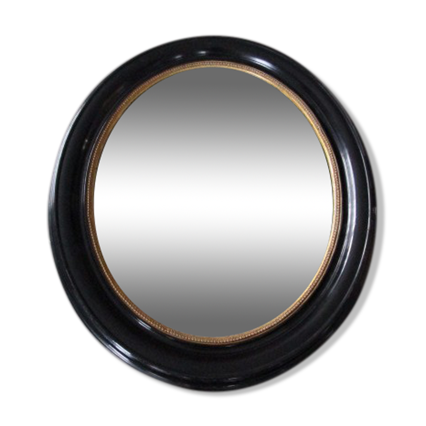 Miroir ovale bois noirci époque Napoléon III - 59x51cm