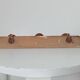 Vintage popular art wall coat rack from the 1950s