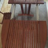 Table ovale à rallonge en bois bubinga verni triconfort avec ses 6 chaises